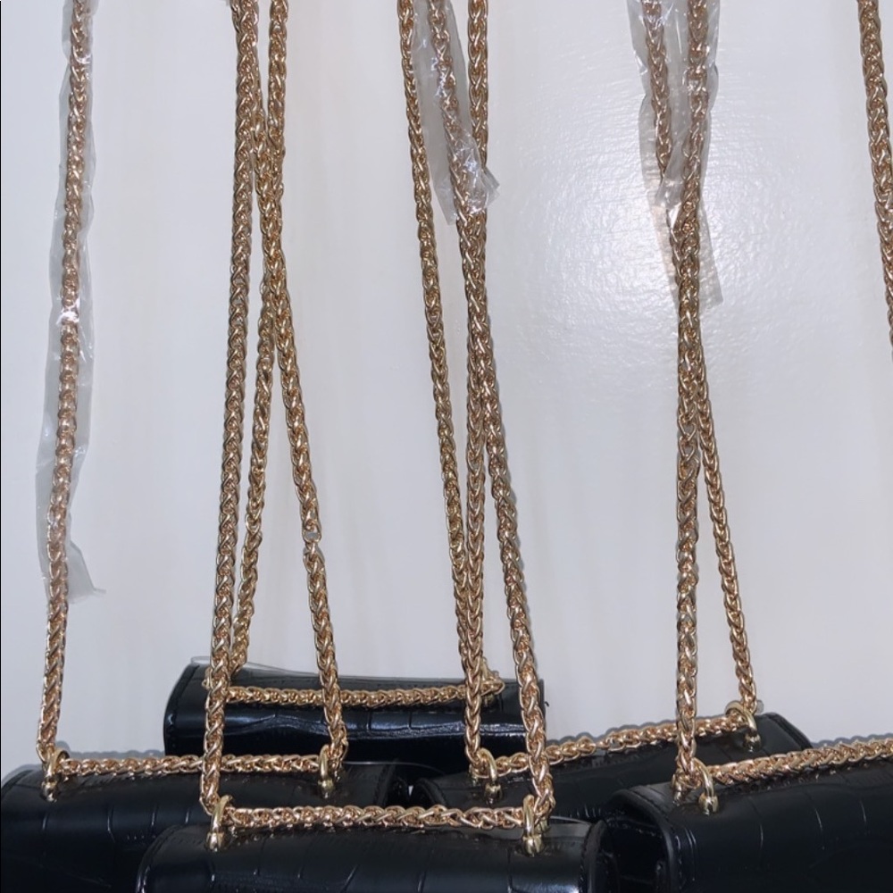 Black snake print “mini bag”